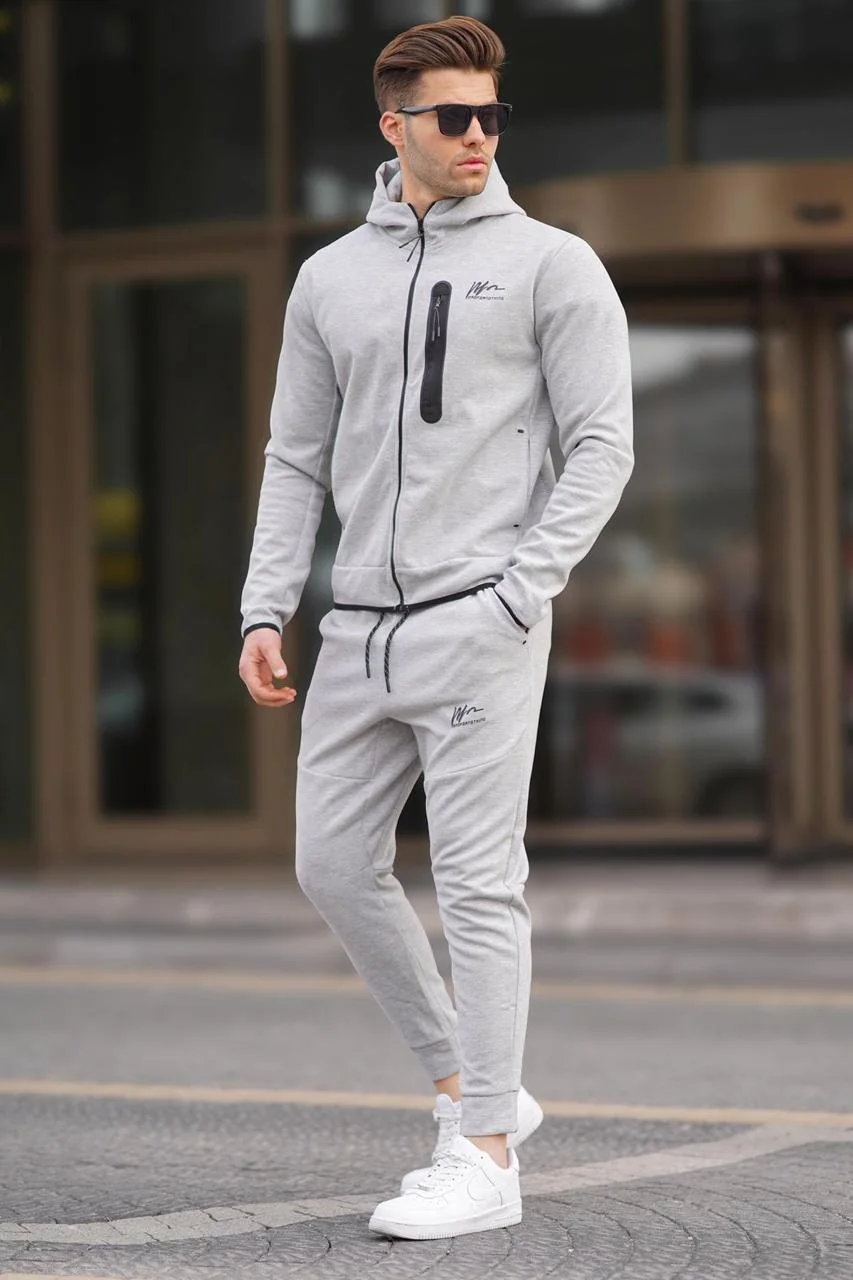 Light grey zip tracksuit with dark zip details, supplied style reference